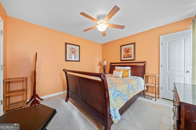 bedroom featuring ceiling fan and light tile patterned flooring