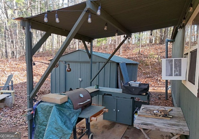 view of patio featuring a storage unit and area for grilling