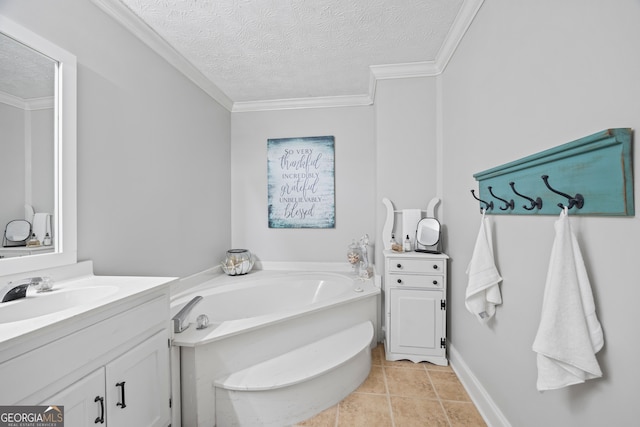 bathroom with a tub to relax in, tile patterned floors, crown molding, a textured ceiling, and vanity