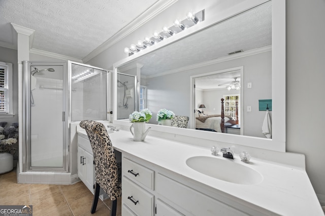 bathroom with ornamental molding, a textured ceiling, and walk in shower