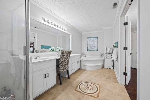 bathroom featuring vanity, tile patterned floors, ornamental molding, shower with separate bathtub, and a textured ceiling