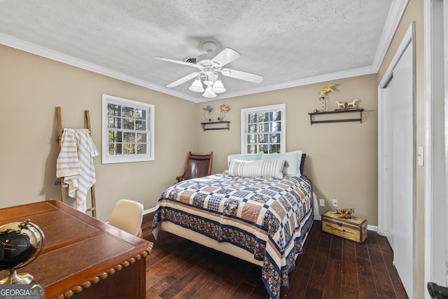 bedroom featuring a textured ceiling, ceiling fan, crown molding, multiple windows, and dark hardwood / wood-style floors