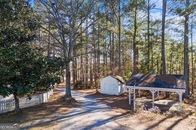 view of front of house featuring a storage shed