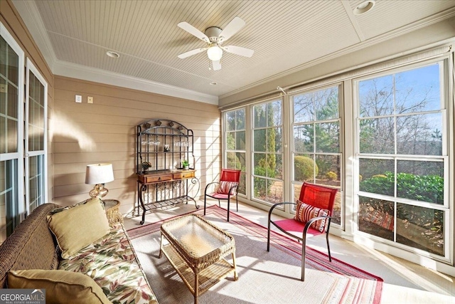 sunroom / solarium with ceiling fan