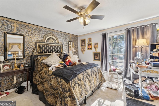 bedroom with light carpet and ceiling fan