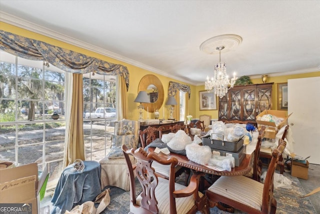 dining space featuring a notable chandelier and ornamental molding