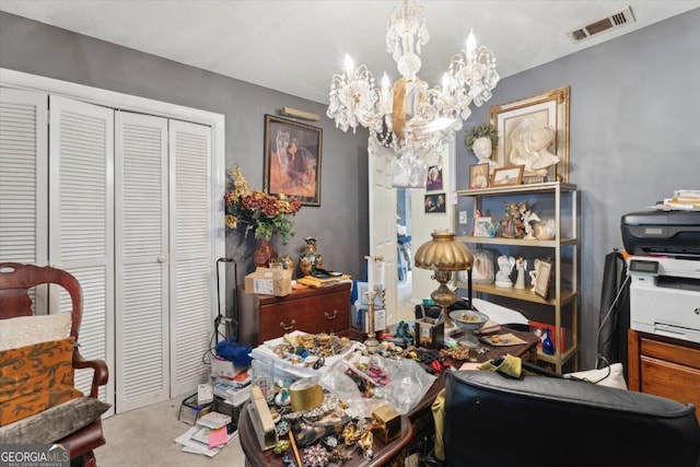 misc room featuring carpet and a notable chandelier