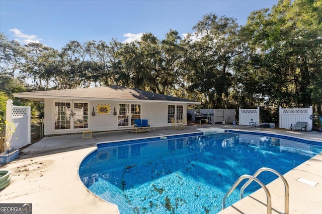 view of pool featuring a patio area