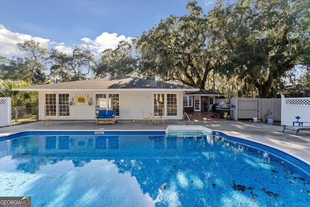 view of pool with a patio