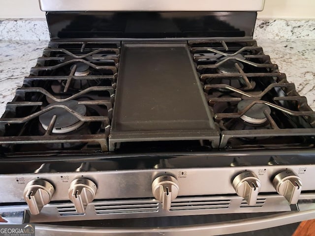 details with stainless steel range with gas cooktop