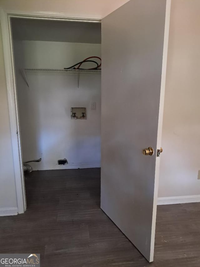 laundry area with washer hookup and dark hardwood / wood-style floors