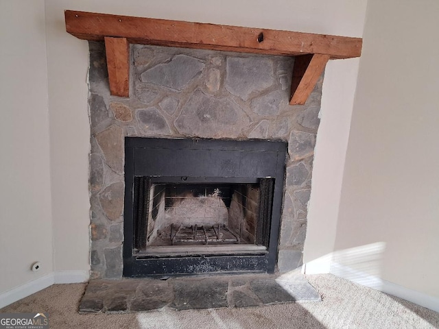 interior details with carpet flooring and a fireplace