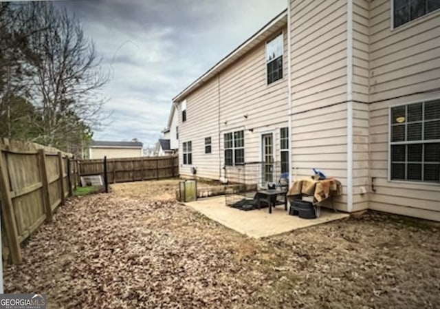 back of house featuring a patio area