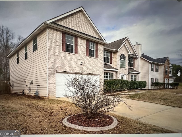 view of front of home with a garage