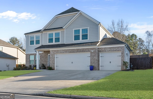 view of front facade featuring a front lawn and a garage