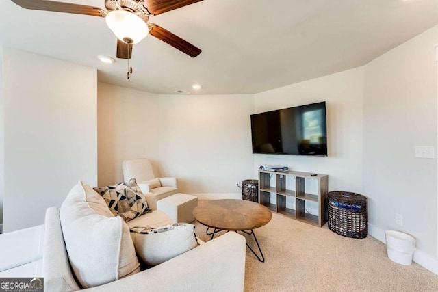 living room with carpet flooring and ceiling fan