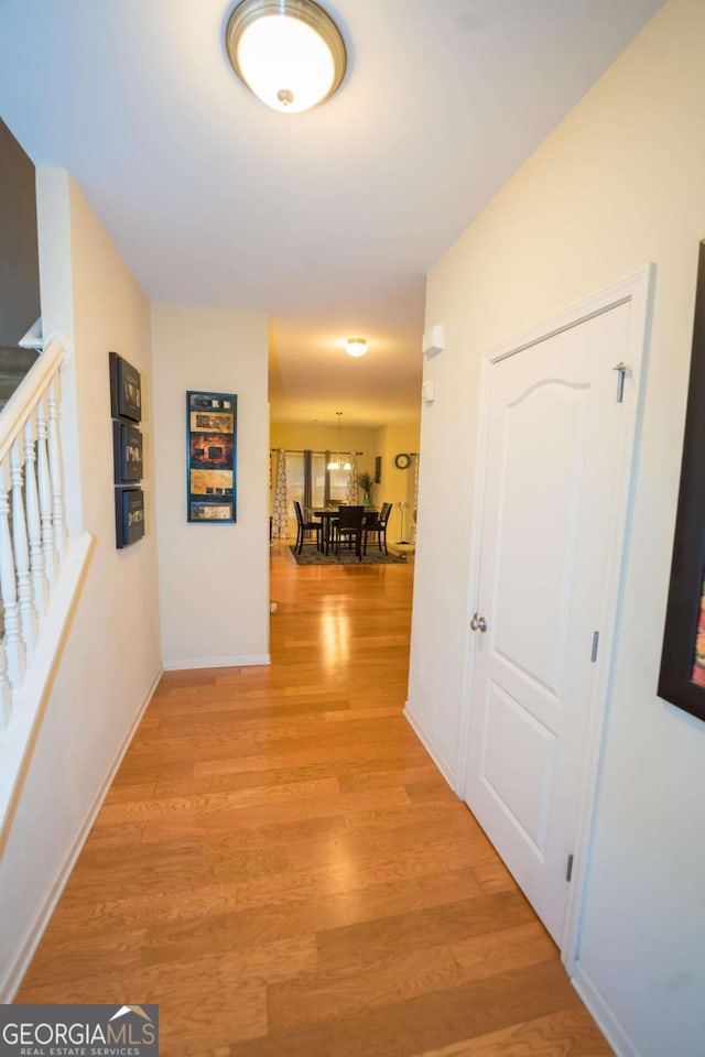 hallway featuring light hardwood / wood-style floors