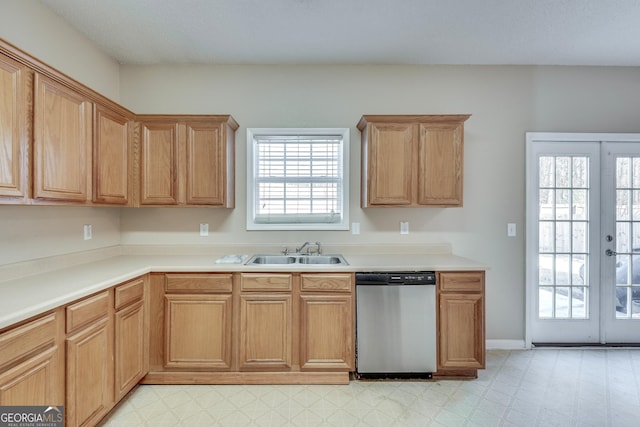 kitchen with dishwasher, french doors, and sink