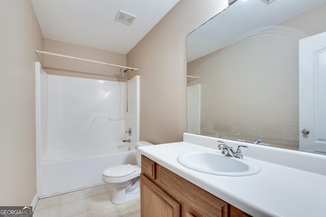 full bathroom featuring vanity, toilet, shower / tub combination, and a textured ceiling