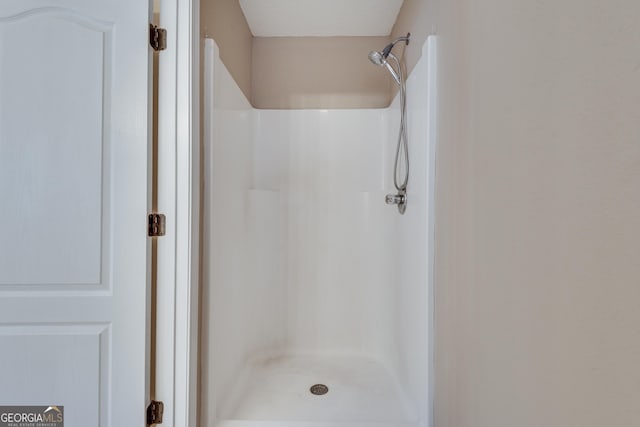 bathroom with walk in shower