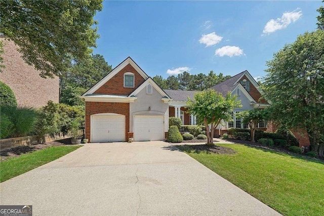 view of front of property with a garage and a front lawn