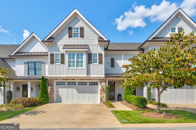 view of front of property with a garage