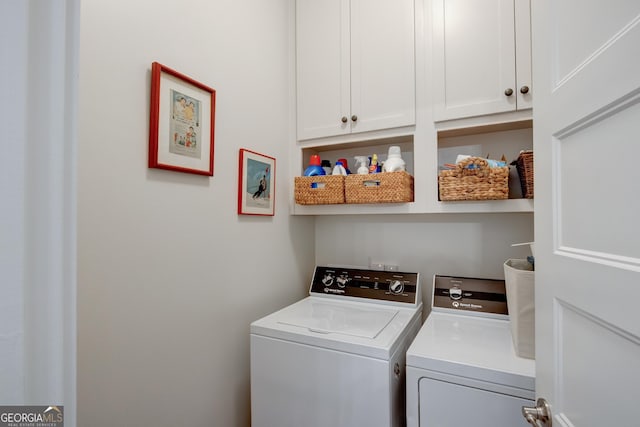 laundry room with cabinets and independent washer and dryer