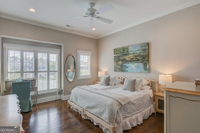 bedroom featuring ceiling fan, crown molding, and dark wood-type flooring