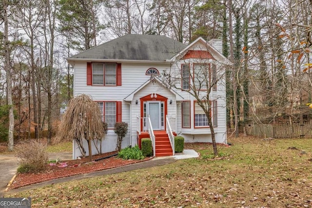 view of front property featuring a front lawn