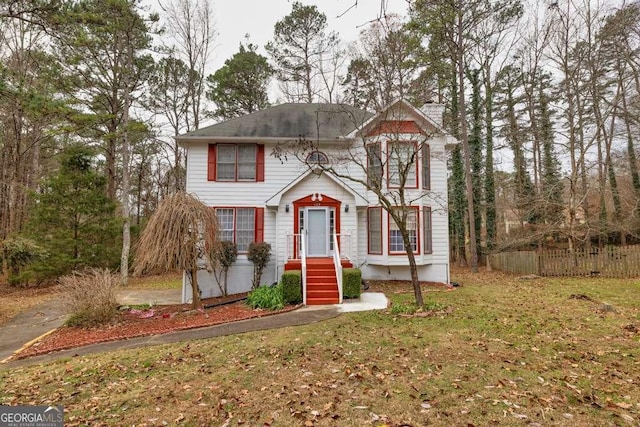 view of front of home featuring a front lawn