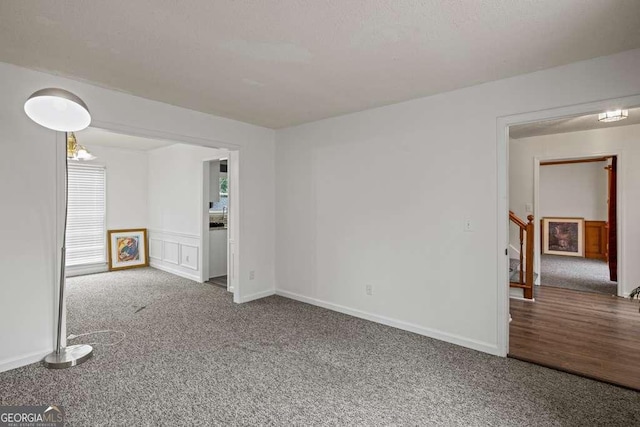 empty room featuring carpet flooring