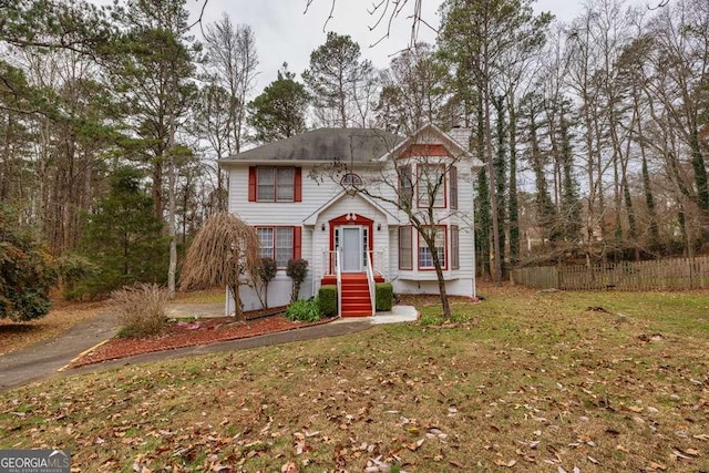 front facade with a front lawn