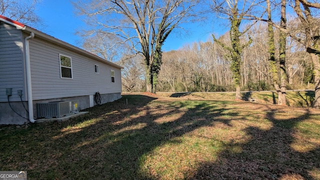 view of yard with central AC