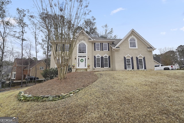 view of front facade with a front lawn