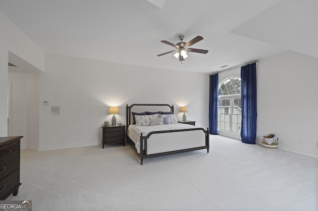 bedroom featuring ceiling fan and light colored carpet