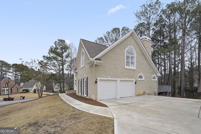 view of home's exterior with a garage