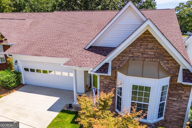 view of front of property with a garage