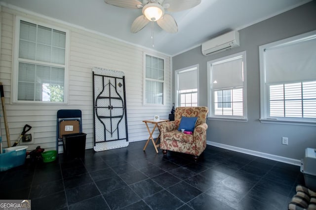 living area with a wall unit AC, ceiling fan, and ornamental molding