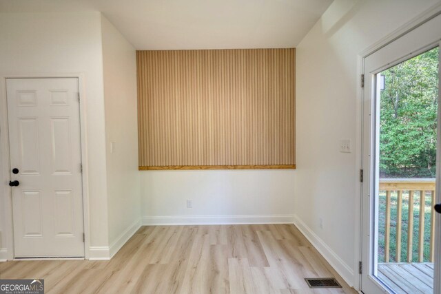 empty room featuring light hardwood / wood-style floors