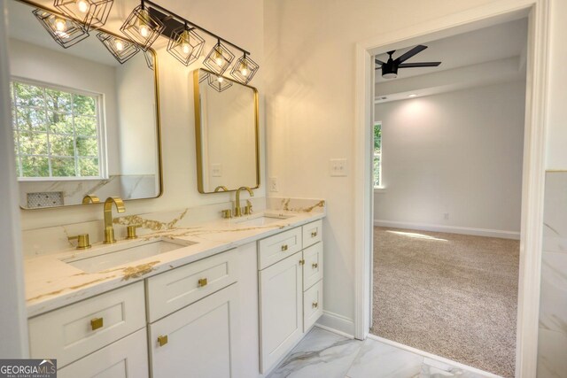 bathroom featuring vanity and ceiling fan