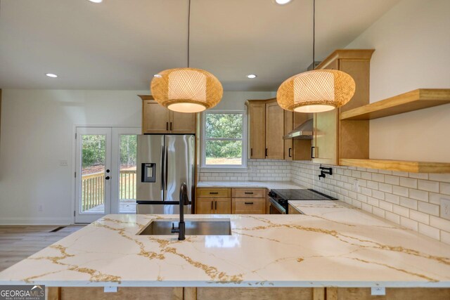 kitchen featuring sink, stainless steel appliances, tasteful backsplash, ventilation hood, and decorative light fixtures