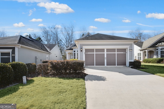 view of home's exterior featuring a garage and a yard