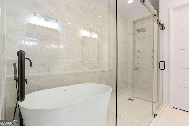 bathroom with independent shower and bath