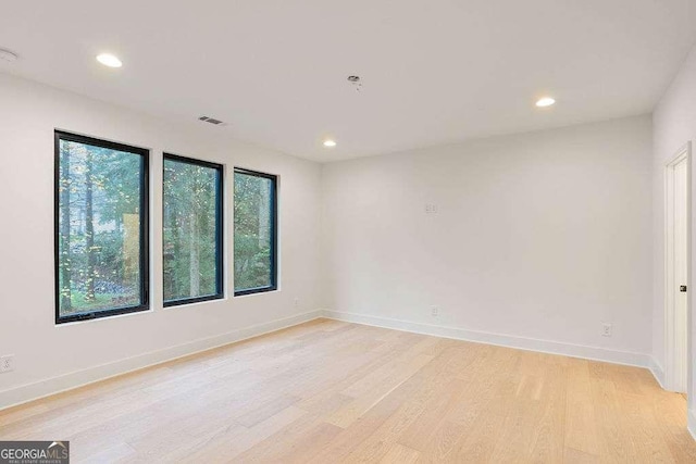 empty room featuring light wood-type flooring