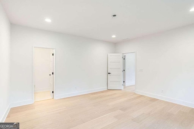 empty room featuring light hardwood / wood-style floors