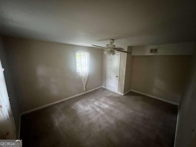 unfurnished bedroom with ceiling fan and carpet floors