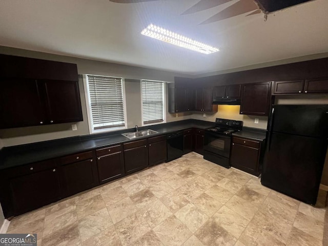 kitchen featuring dark brown cabinets, sink, and black appliances