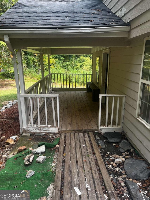 wooden terrace with covered porch