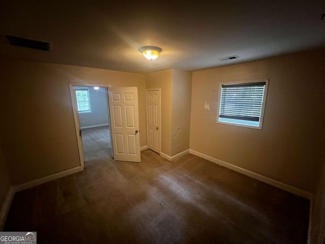 empty room with carpet floors