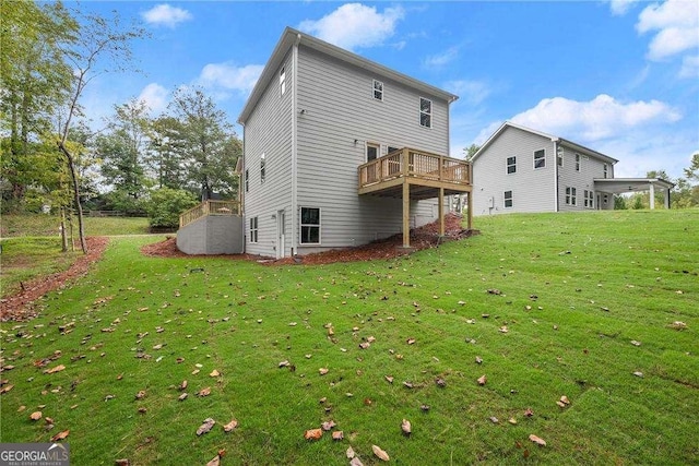 back of property featuring a lawn and a deck